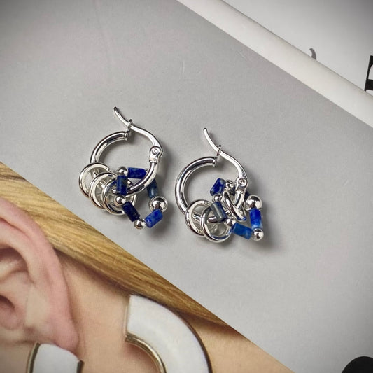 Elegant Lapis Lazuli earrings with deep blue natural gemstones inspired by timeless jewelry design.