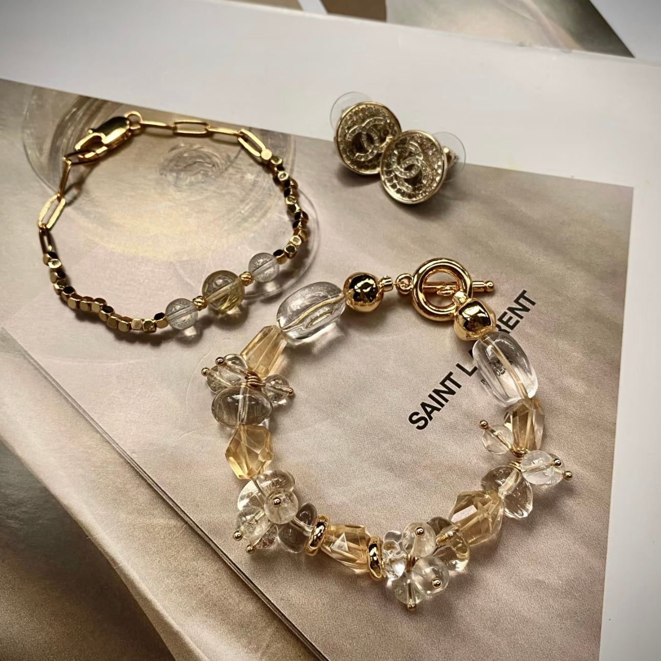 Rutilated quartz and citrine bracelet detail shot — waterproof 24K gold titanium steel hardware
