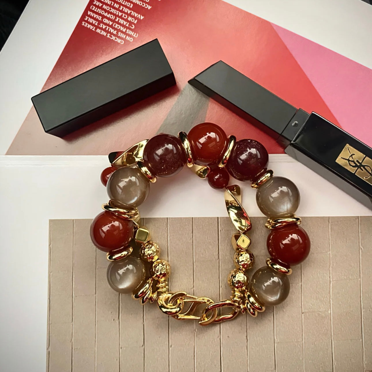 Styling the carnelian statement bracelet with luxury rings for a bold, modern boho look.
