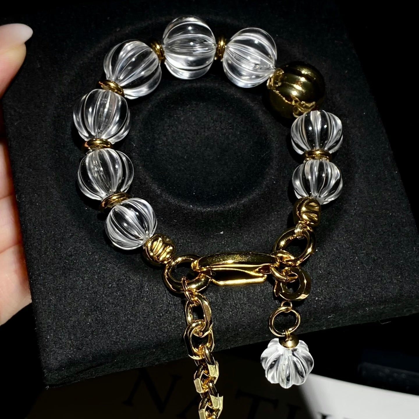 luxury transparent bead bracelet flat lay modern jewelry aesthetic