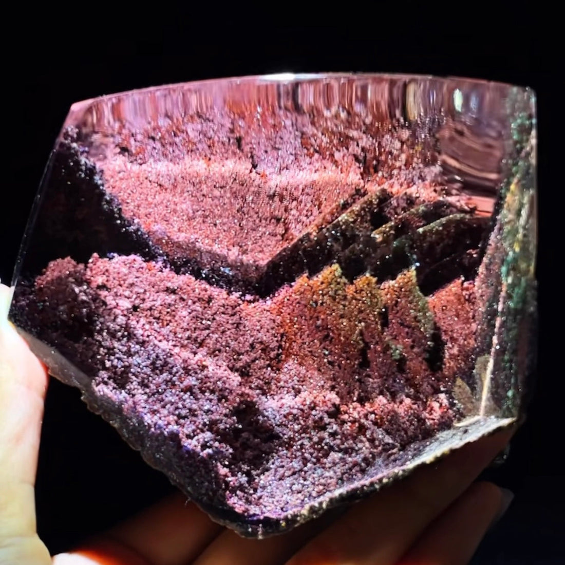 Uncut natural rutilated quartz in its raw form, covered in earth and mineral oxidation, directly from the mine.