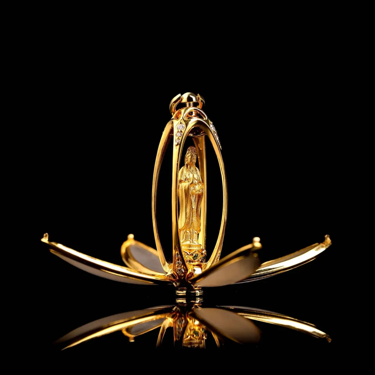 18K Gold Crystal Buddhist Shrine Pendant laid flat on neutral surface showing full piece and chain length