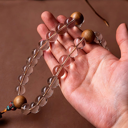Hand wearing 8mm premium clear crystal agarwood mala wrist bracelet, real hand effect show daily wear