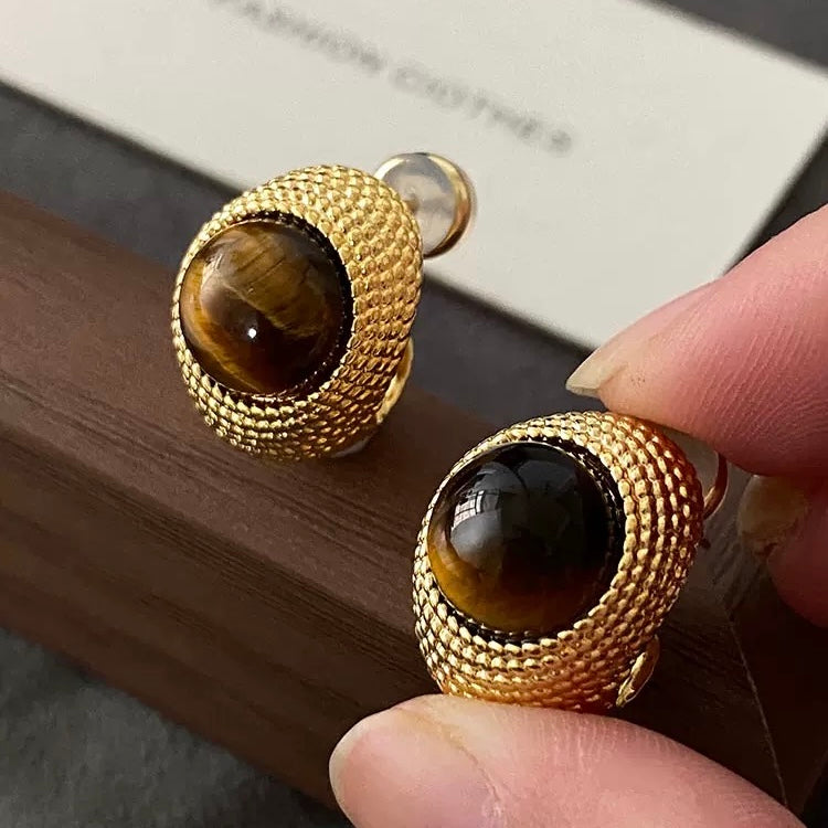 Rear view of the Tiger's Eye studs showing the secure 925 sterling silver post and high-quality gold plating.
