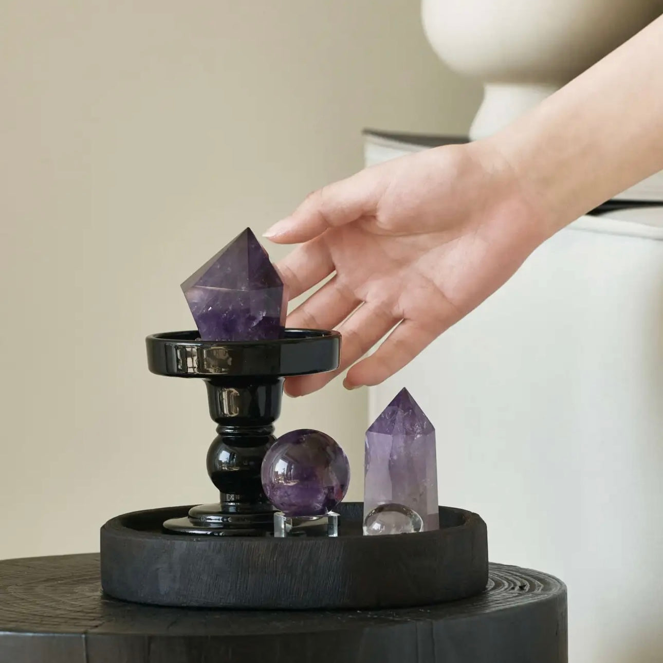 Elegant amethyst crystal grid displayed in a modern study room to promote wisdom, focus, and career success.