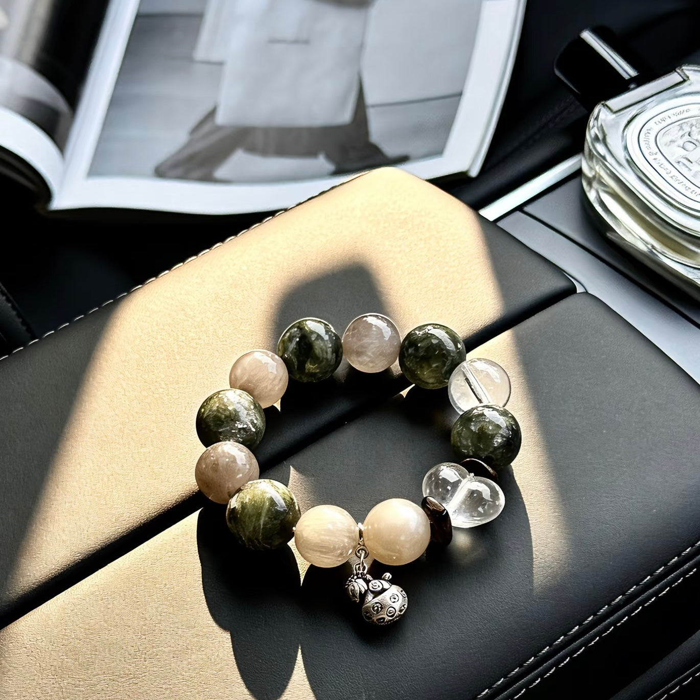 Close-up showing the substantial 15mm scale of the Green Phantom beads, highlighting the "Wilderness" texture.