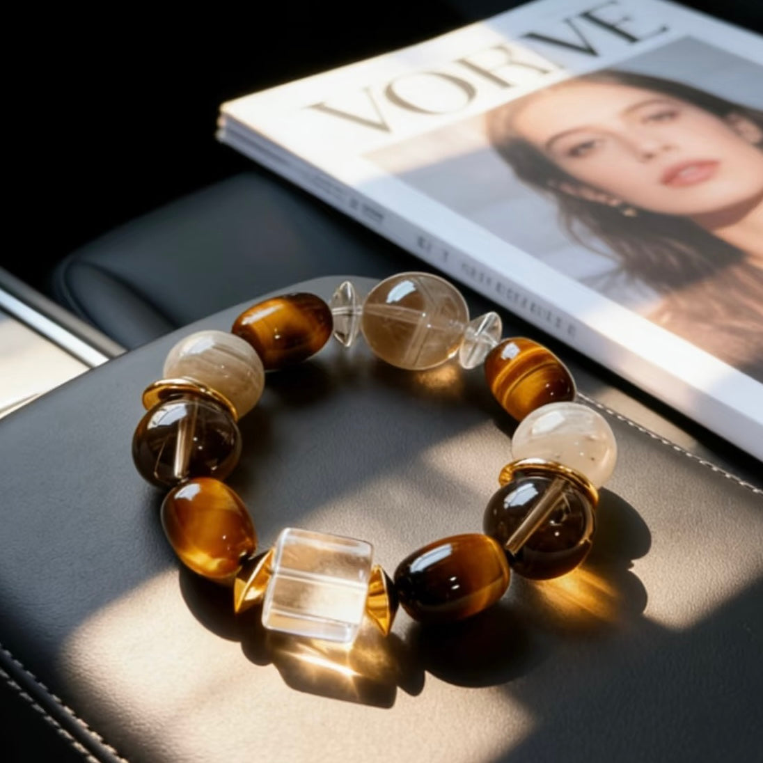 Detailed view of the 16mm honey-gold Tiger's Eye beads, demonstrating the weighted luxury scale of the bracelet.