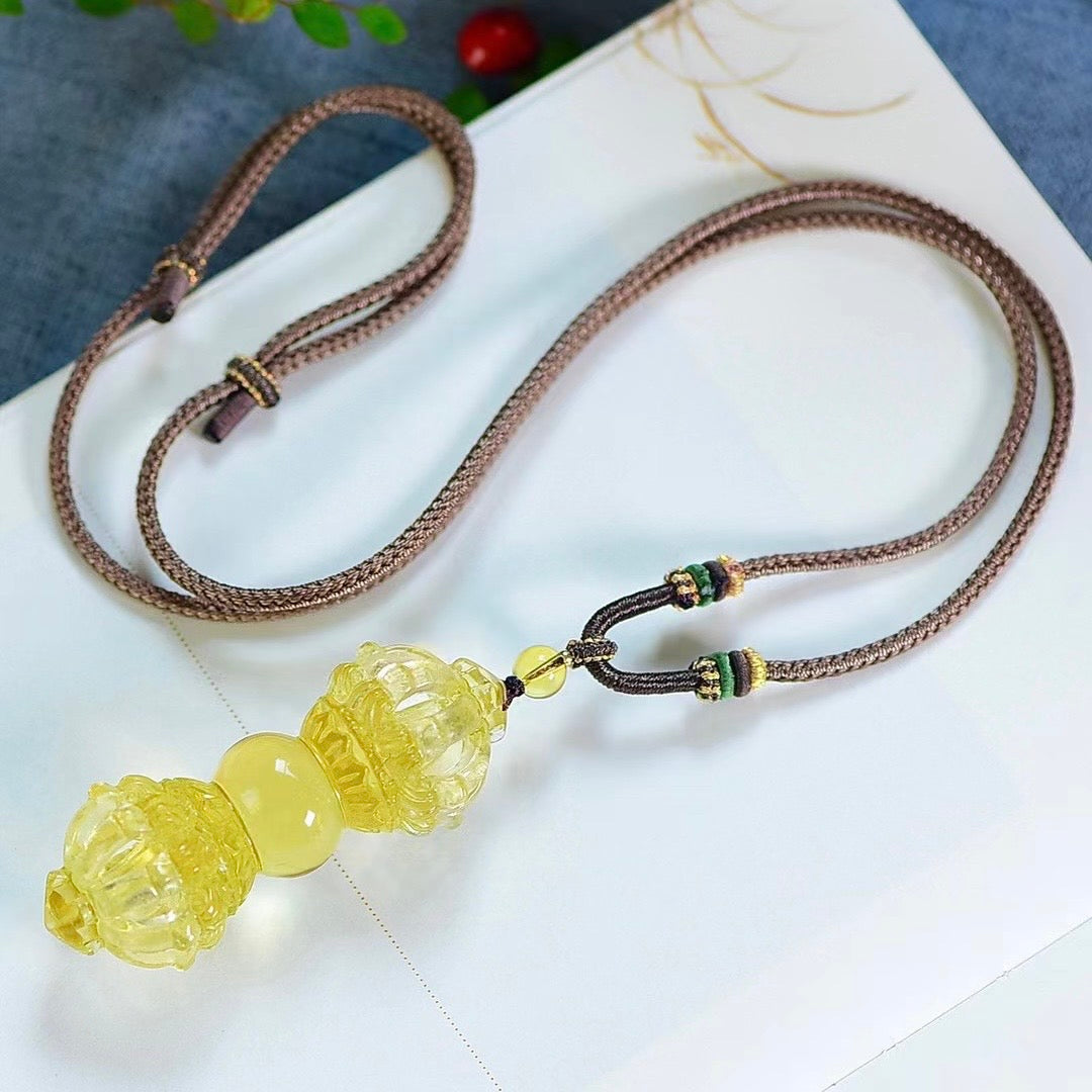 Brazilian Yellow Crystal Nine-Pronged Vajra Pendant front view showing full form and vivid golden crystal tone