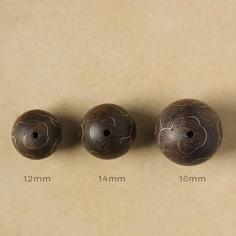 Visual contrast between luminous white crystal and deep, textured agarwood beads.