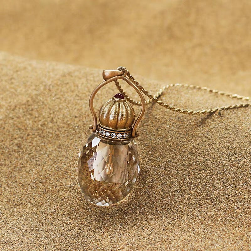 Close-up of the bottle mouth inlaid with Cubic Zirconia, highlighting the lustrous clarity of the natural quartz.