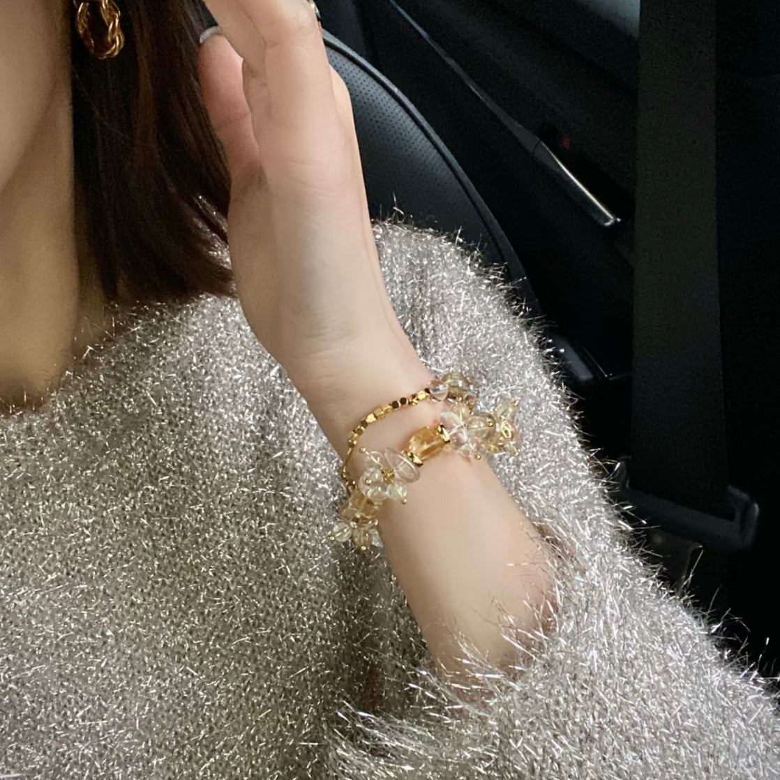 Natural Brazilian citrine freeform bracelet with rutilated quartz bonus piece on hand model