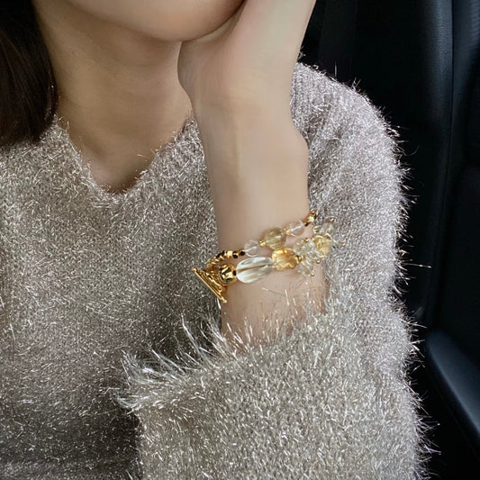 Stacked citrine and clear quartz double bracelet set worn on wrist — Gentle Crystals Twilight Narrative Series