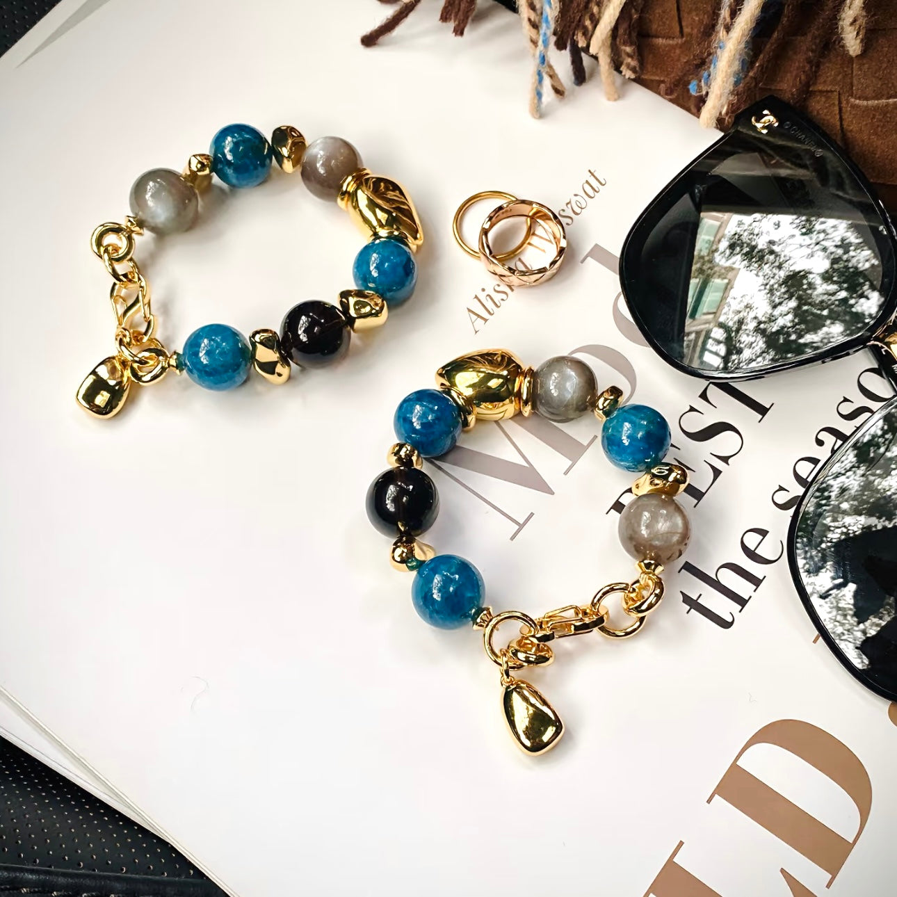 Twilight Tale grey blue apatite and smoky quartz 14mm bracelet flat lay – Gentle Crystals