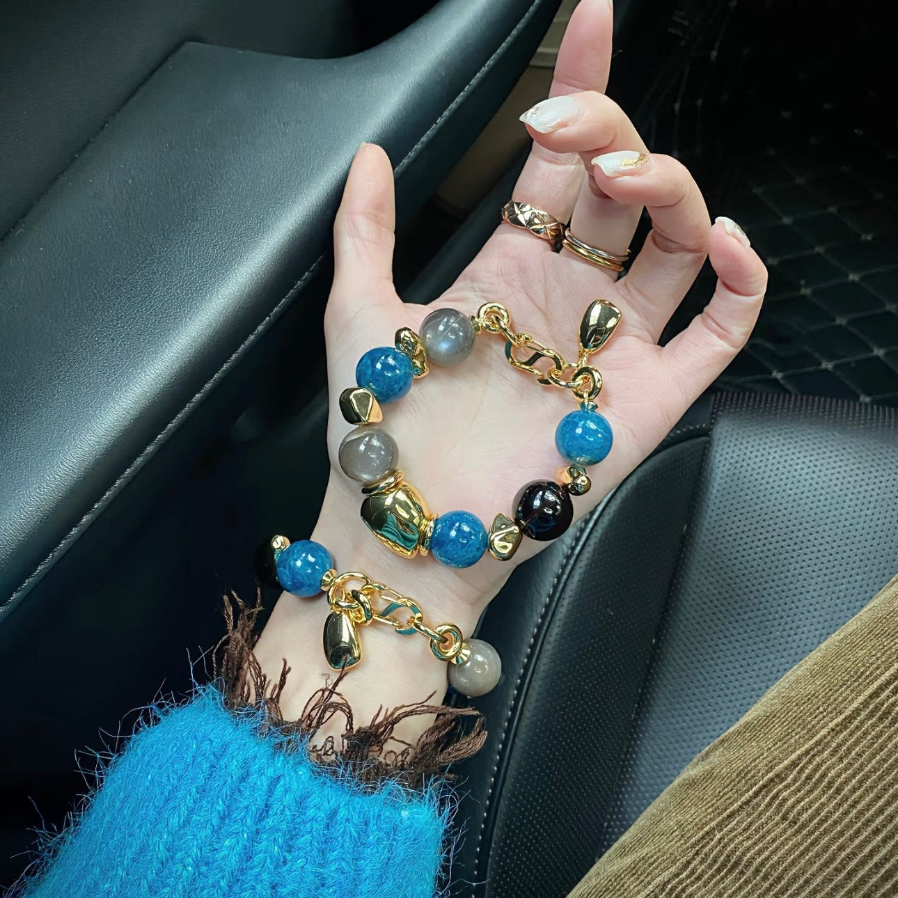 Twilight Tale milk tea moonstone and blue apatite bracelet flat lay – Gentle Crystals