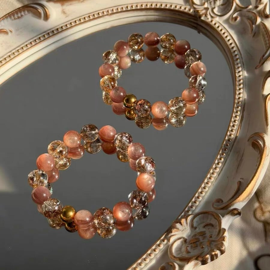 Side-by-side specification view of SeekEven's luxury crystal bracelets, contrasting the elegant 10mm-12mm bead diameter with the commanding 12mm-13mm substantial size.