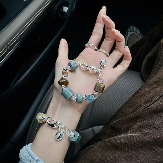Natural Hetian jade and aquamarine bracelet worn on wrist — blue and brown contrast natural stone bracelet for everyday wear and minimalist jewellery styling