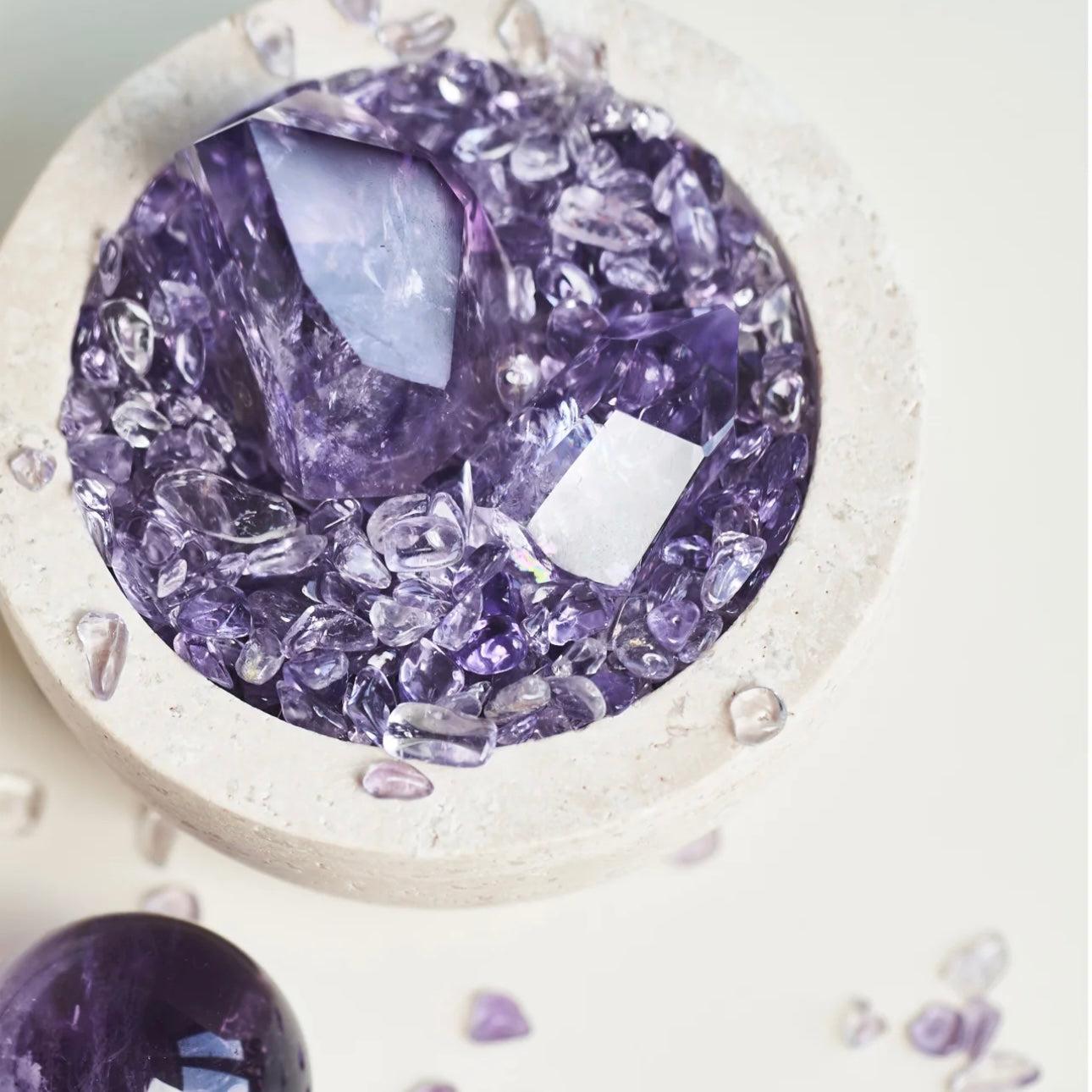 Macro shot of the amethyst points that conduct high-frequency healing energy to dispel negative emotions.