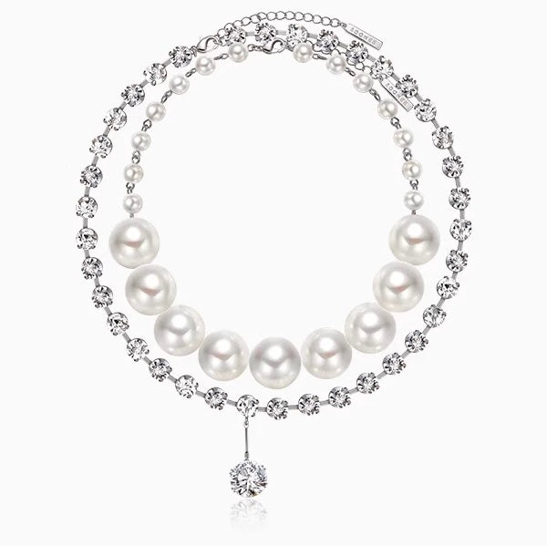 Close-up of the 28mm pearls showing their high-gloss, smooth finish and luxurious luster.