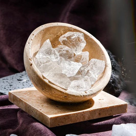 Himalayan Crystal Healing Aromatherapy Ornament featuring clear crystals in a cave stone vessel.