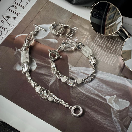 Long-termism snow phantom quartz Lemurian crystal bracelet flatlay - pure white healing crystal jewelry Gentle Crystals