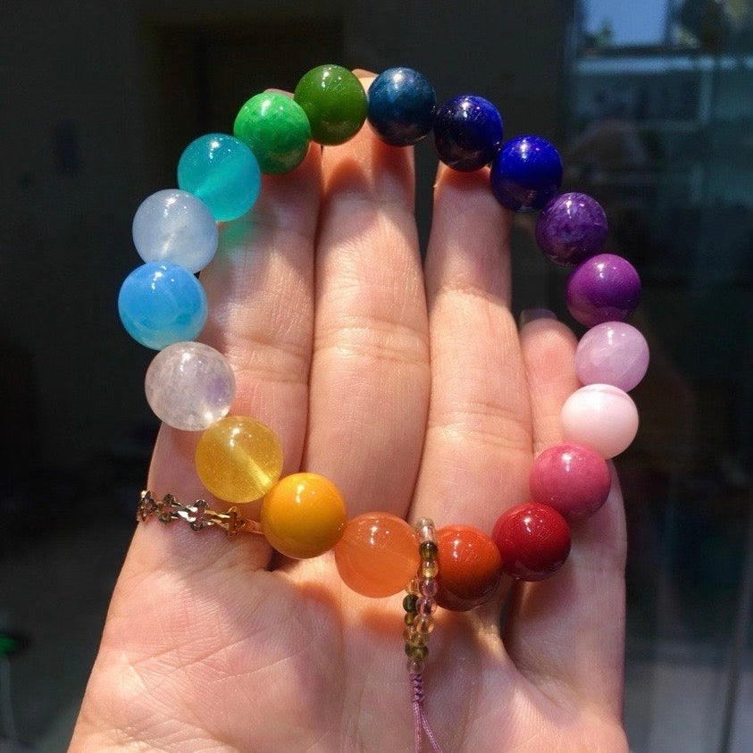 High-gloss moonstone and aquamarine beads showing natural light refraction and clarity.