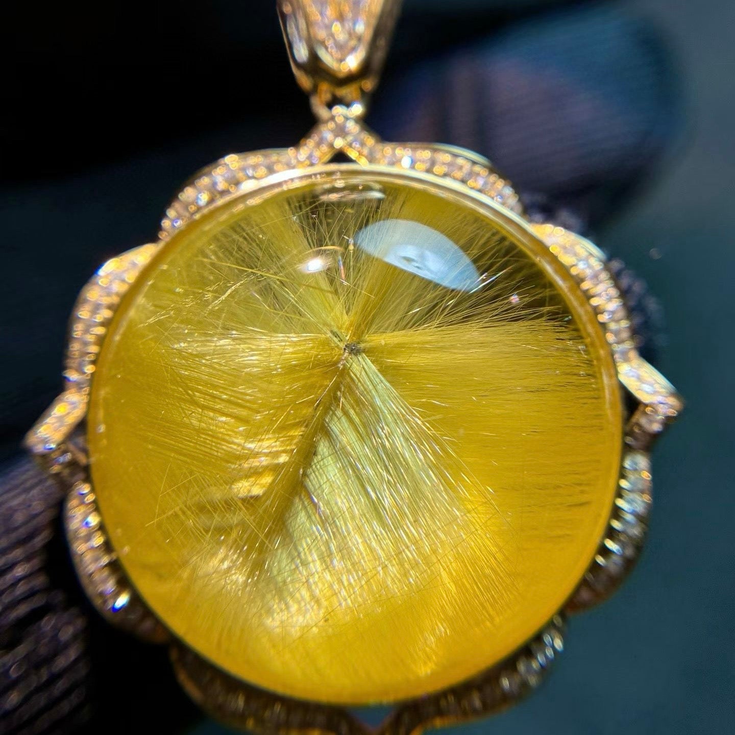 Side view of the 37mm quartz pendant showing the 10.8mm depth and exquisite gold flower frame.