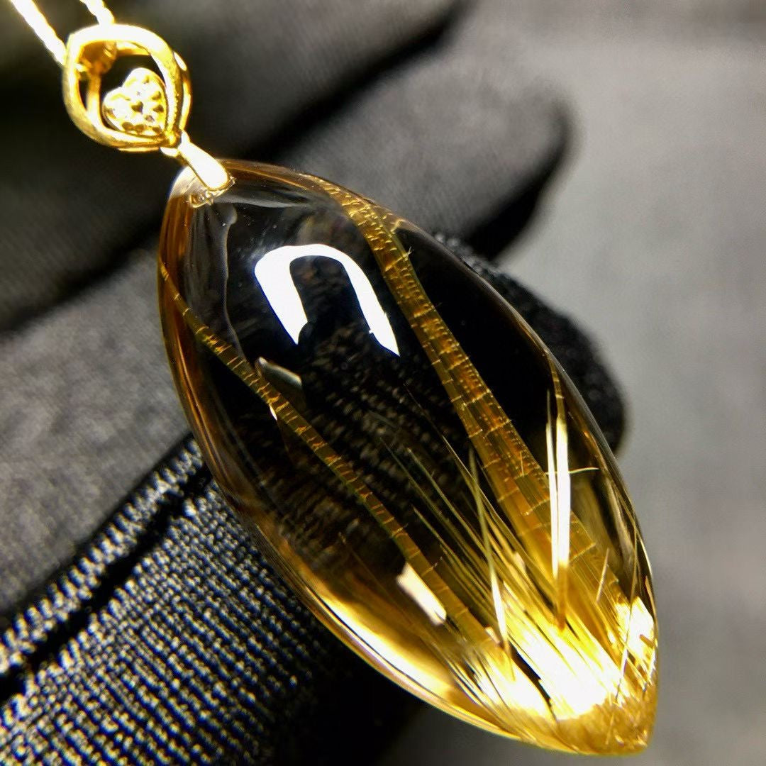 This singular marquise crystal pendant styled as a high-value collector's item for legacy heritage.