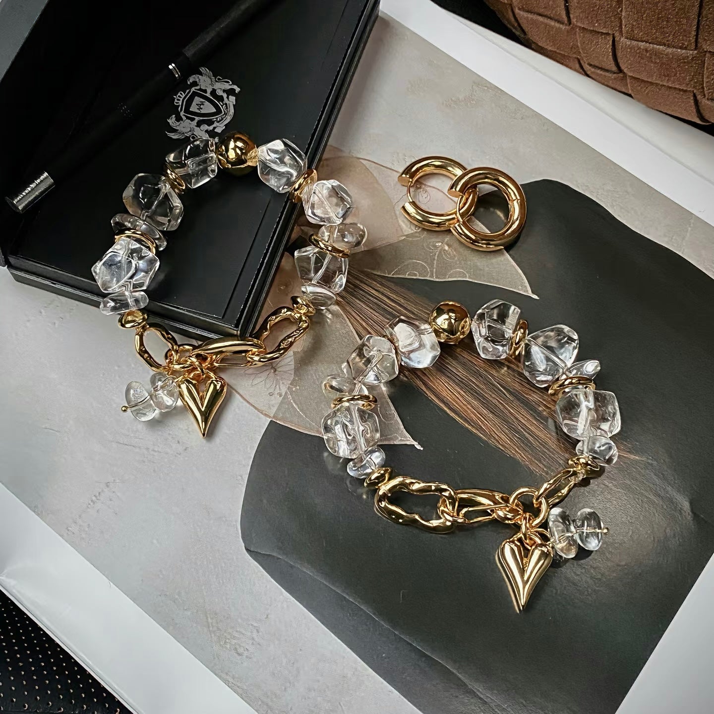Professional styling of the freeform crystal bracelet for a sophisticated luxury look.