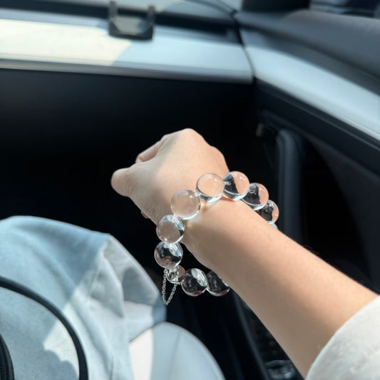 Transparent healing crystal bracelet in natural sunlight