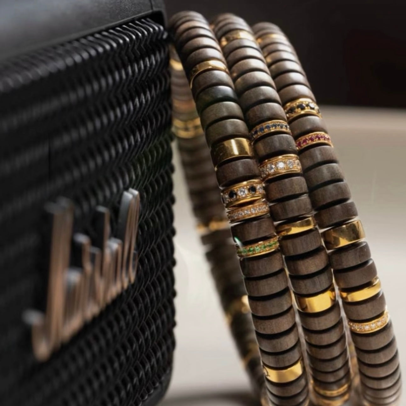 Styling the minimalist sandalwood bracelet with a luxury watch for a Zen-modernist look.
