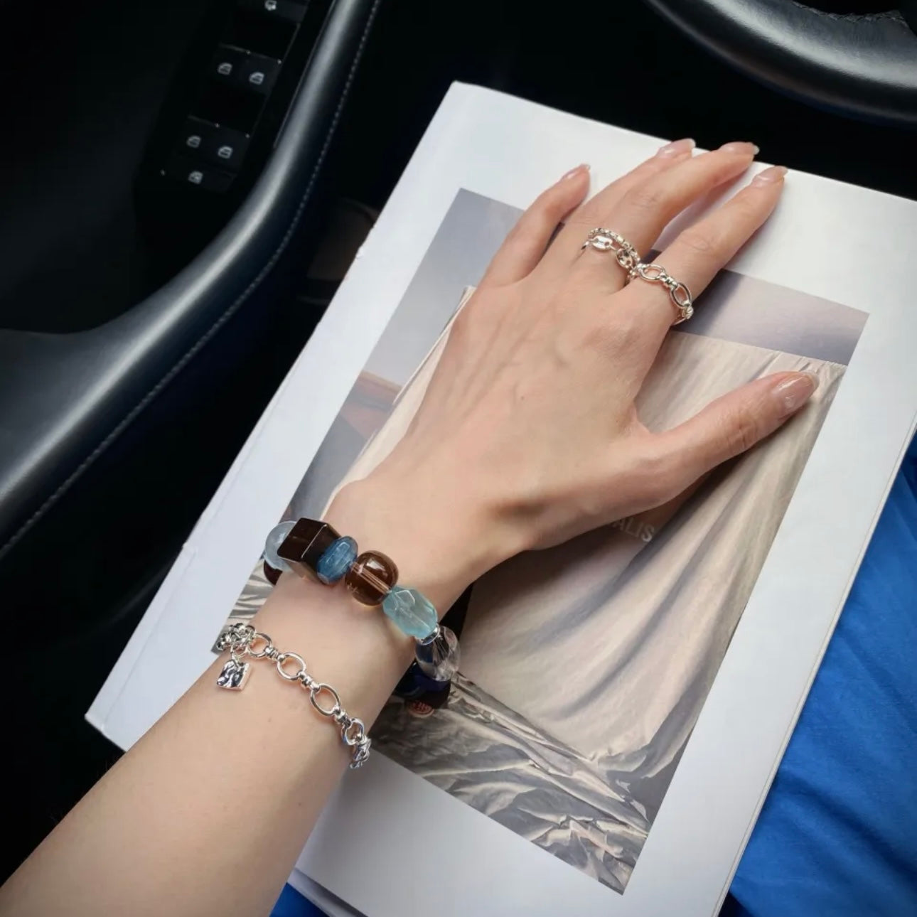 Luxury-inspired Aquamarine and Smoky Quartz bracelet designed to complement modern wardrobes and refined personal style.