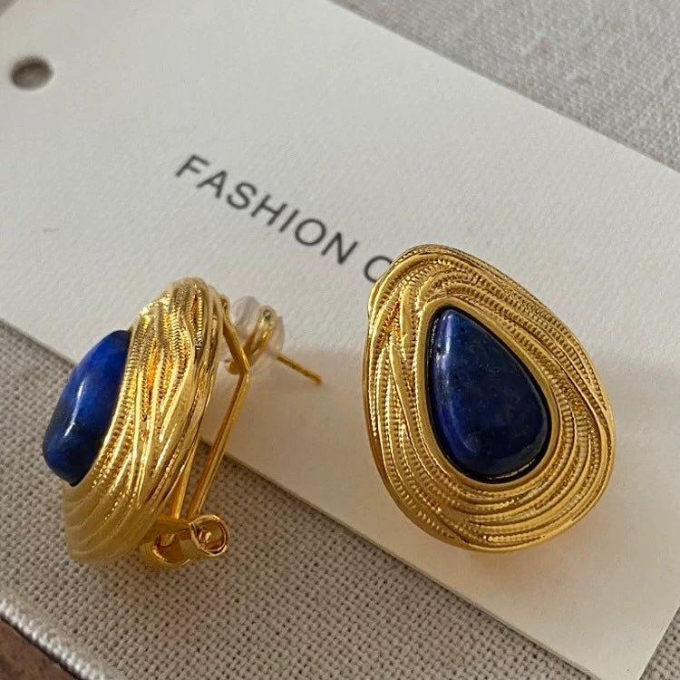 Close-up of natural Lapis Lazuli gemstone showing deep blue hues and golden pyrite flecks.