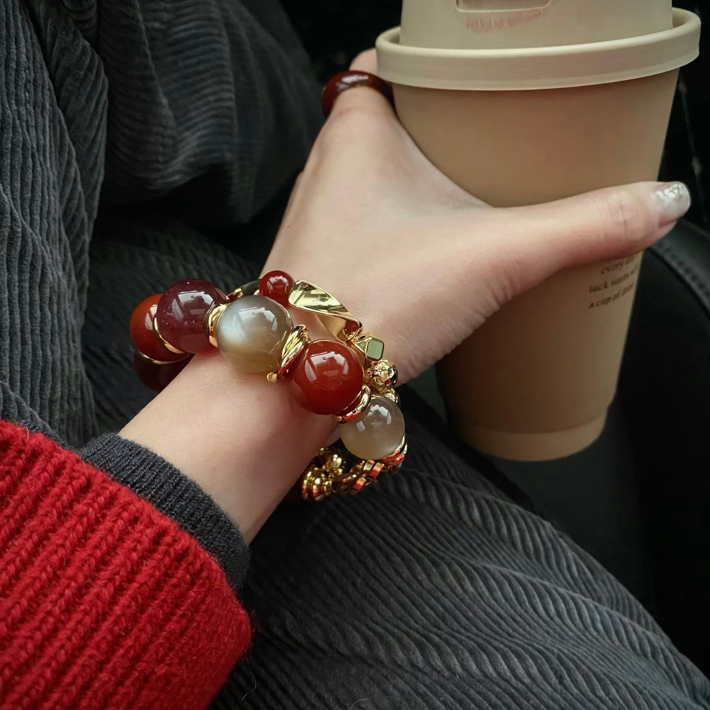 Showing the vibrant sunset hues and translucency of natural carnelian beads in sunlight.