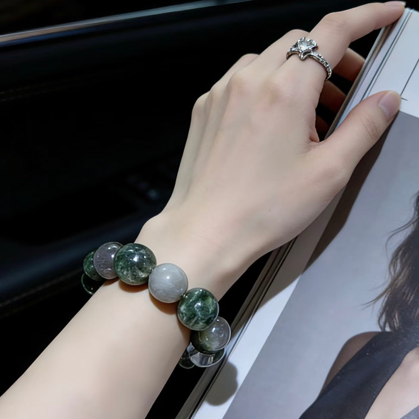 Detailed view of the deep green phantom inclusions inside the quartz, representing career growth and vitality.