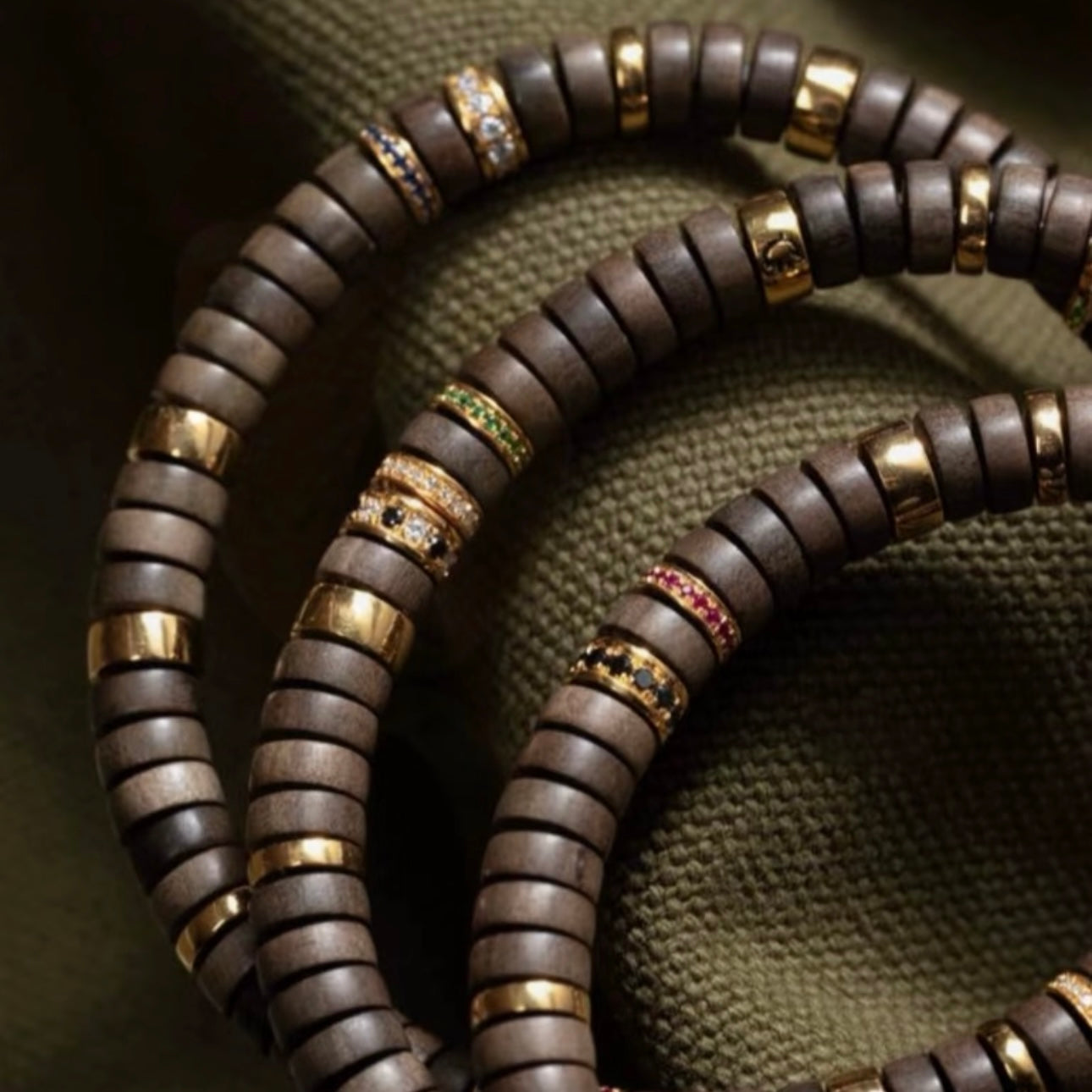 Evocative shot of the scented sandalwood bracelet representing luxury olfactory art.
