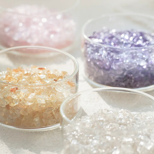 Soft Rose Quartz energy chips in a minimalist glass holder, ideal for promoting self-love and emotional harmony.