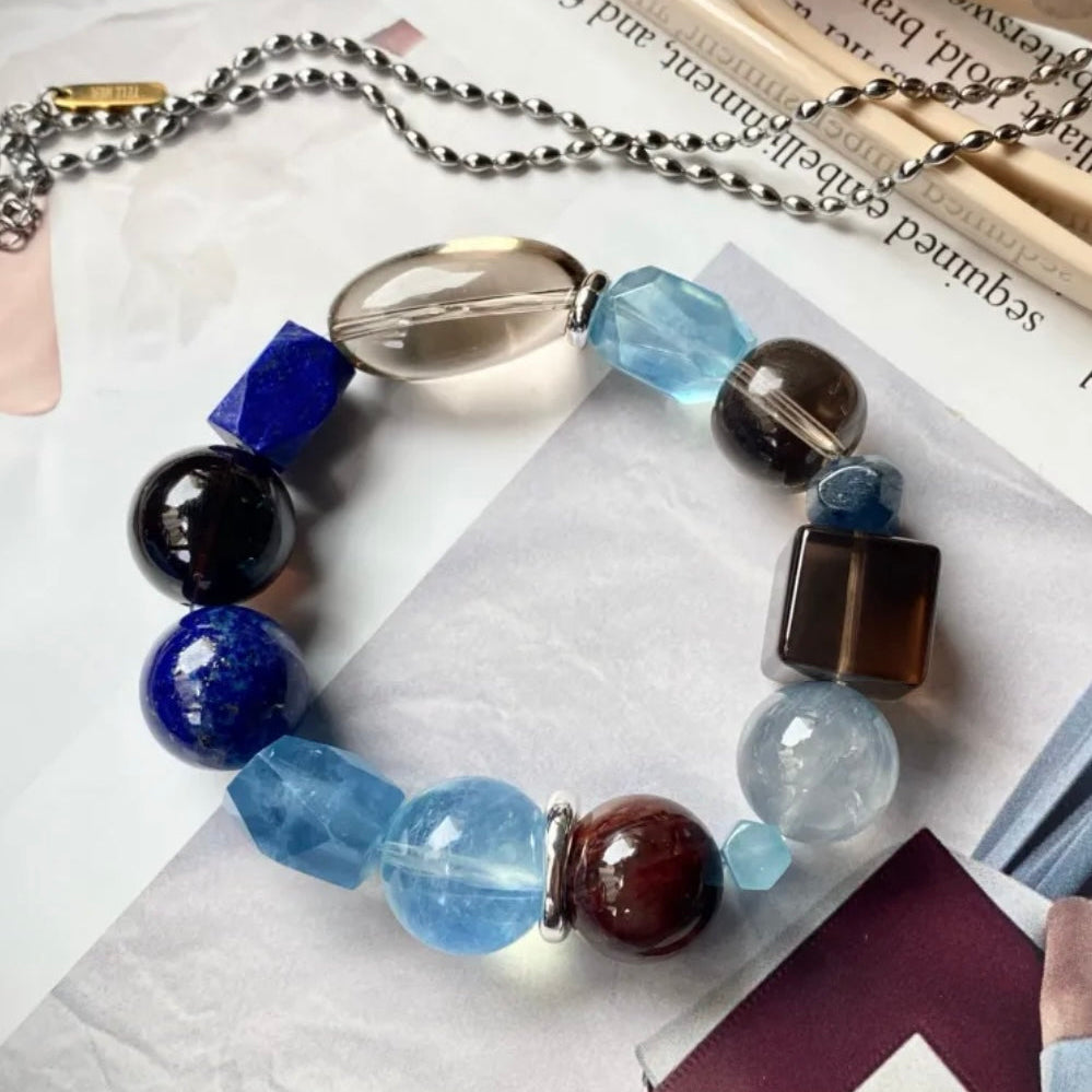Natural Smoky Quartz and Aquamarine bracelet featuring soft blue and earthy brown gemstone beads designed for everyday wear.