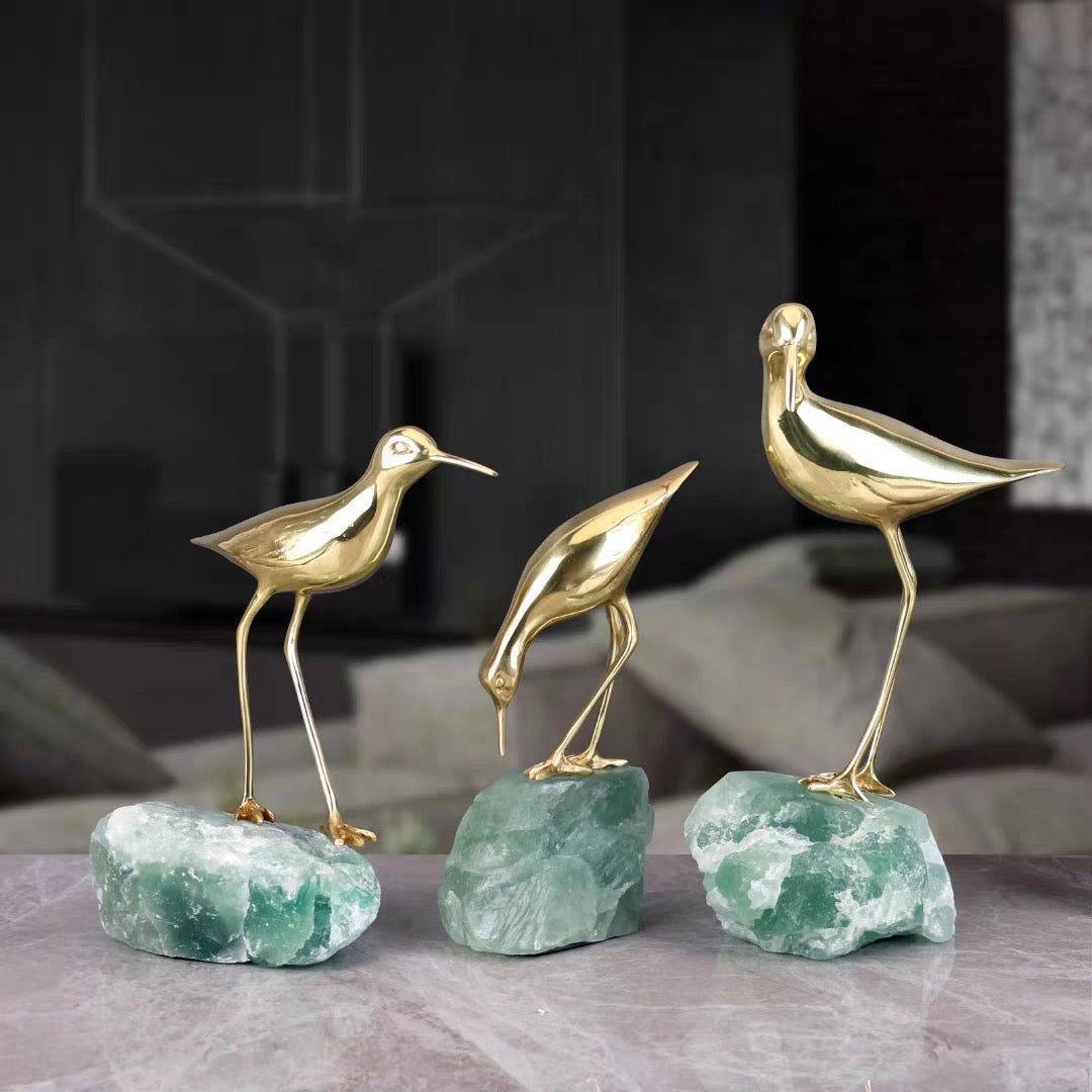 Comparison of the three available styles and sizes of the bronze bird fluorite collection.