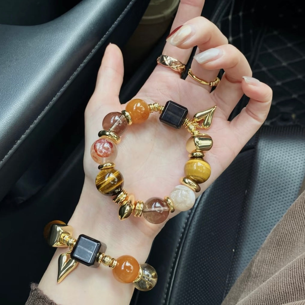 Editorial model wearing Tiger's Eye 3-piece crystal set - healing crystal jewelry old money style Gentle Crystals