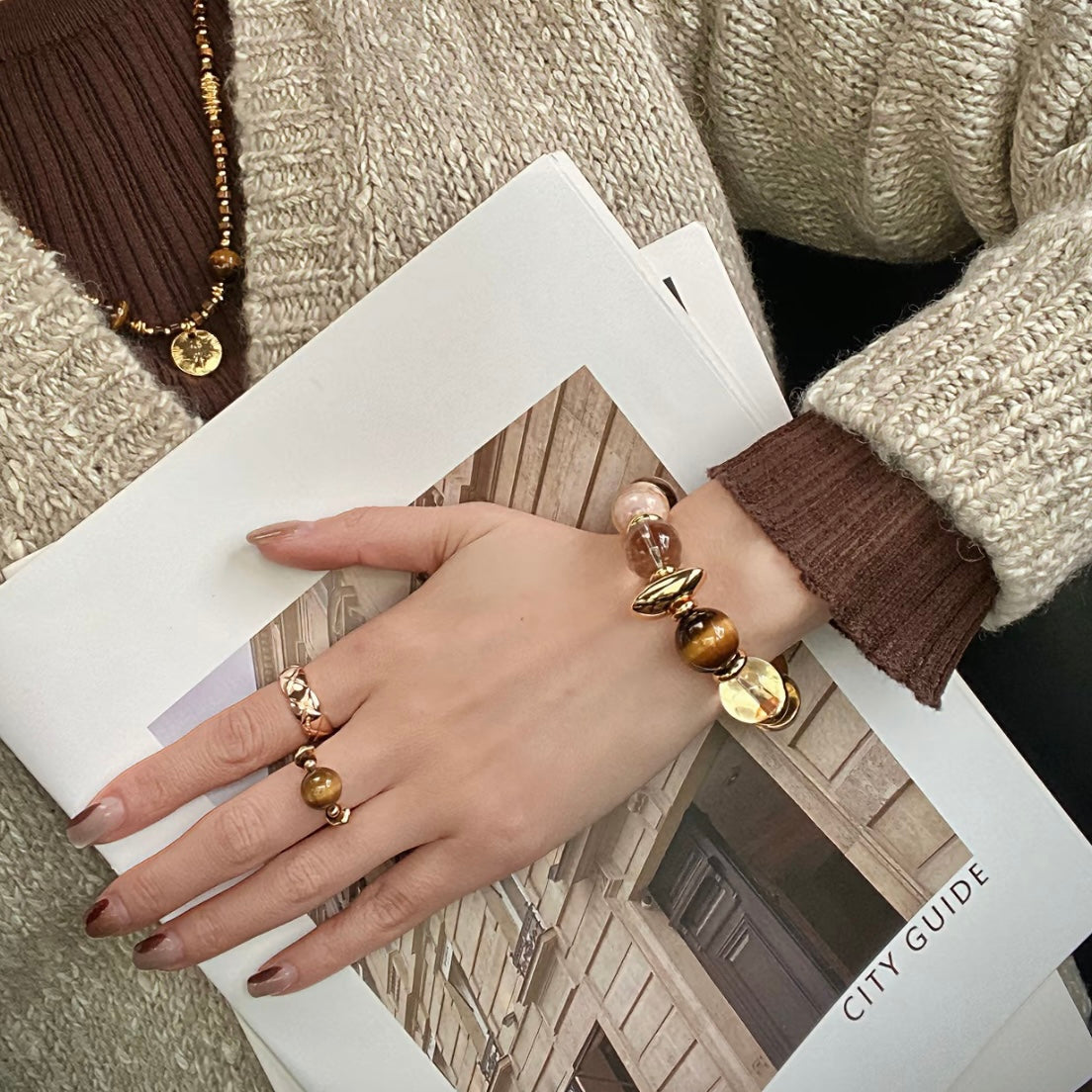 Model wearing Tiger's Eye crystal bracelet and necklace set - Old Money aesthetic luxury jewelry Gentle Crystals