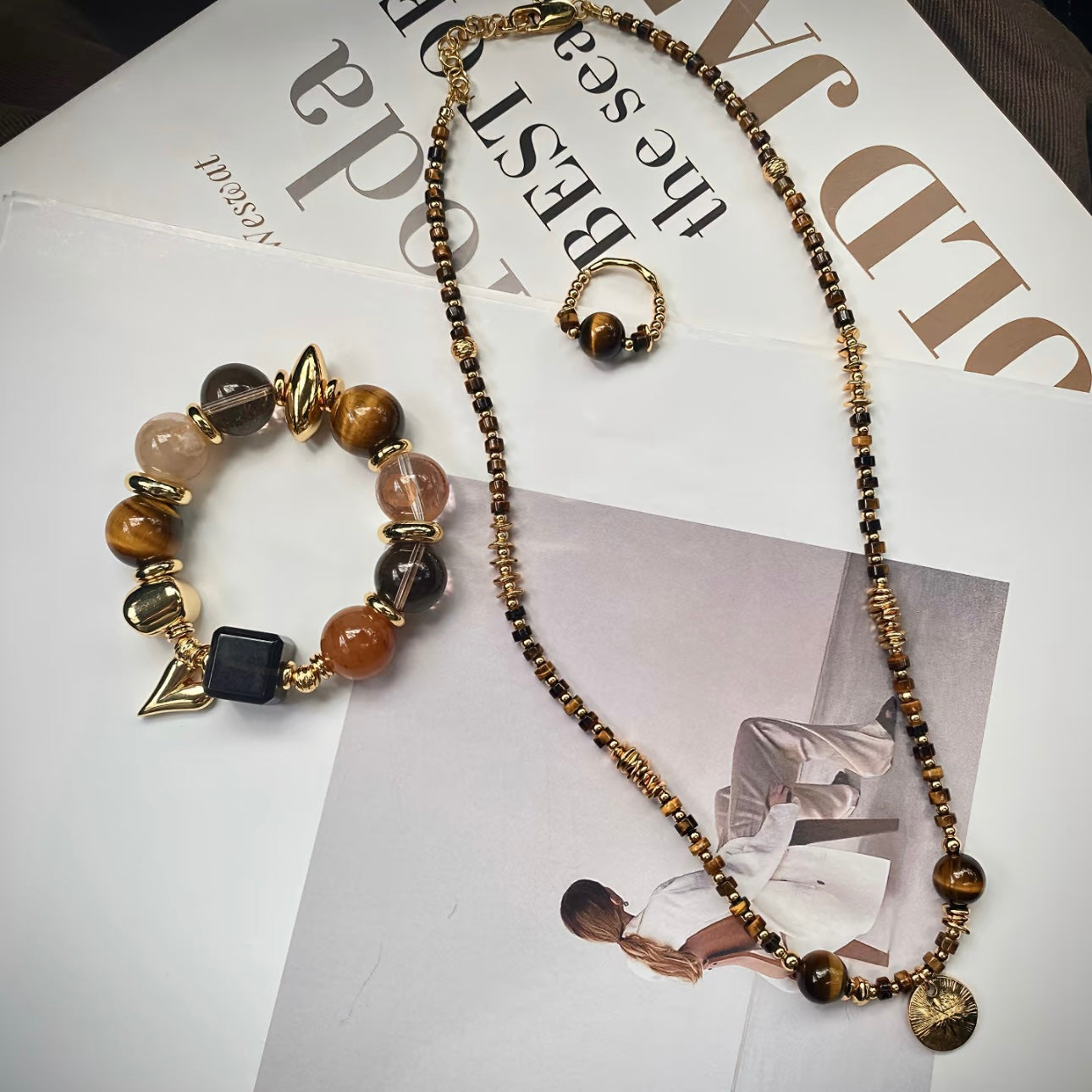iger's Eye Old Money crystal jewelry set flatlay - bracelet necklace ring rutilated quartz obsidian Gentle Crystals