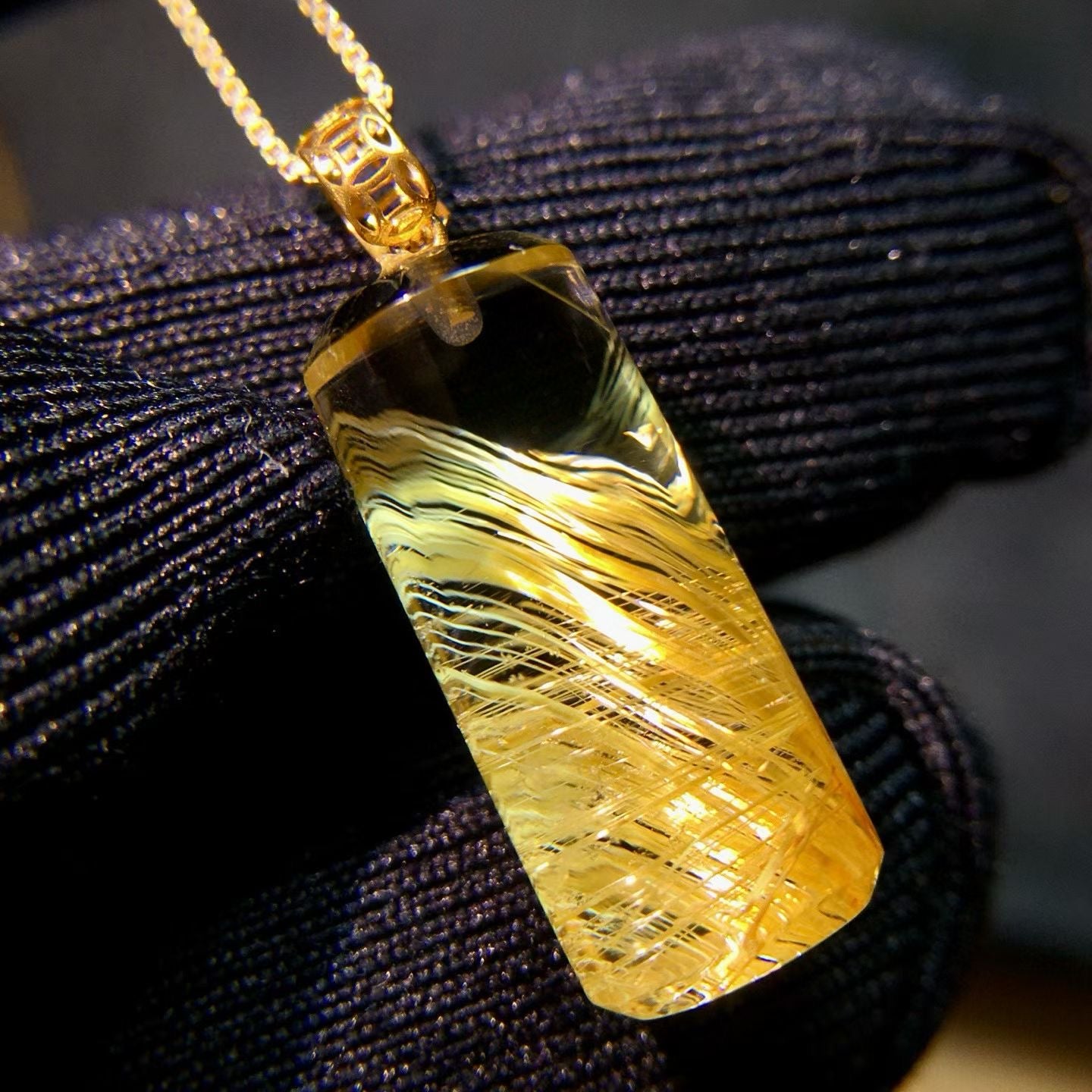 High-transparency shot of this unique 18.8mm titanium crystal specimen in 18K gold.