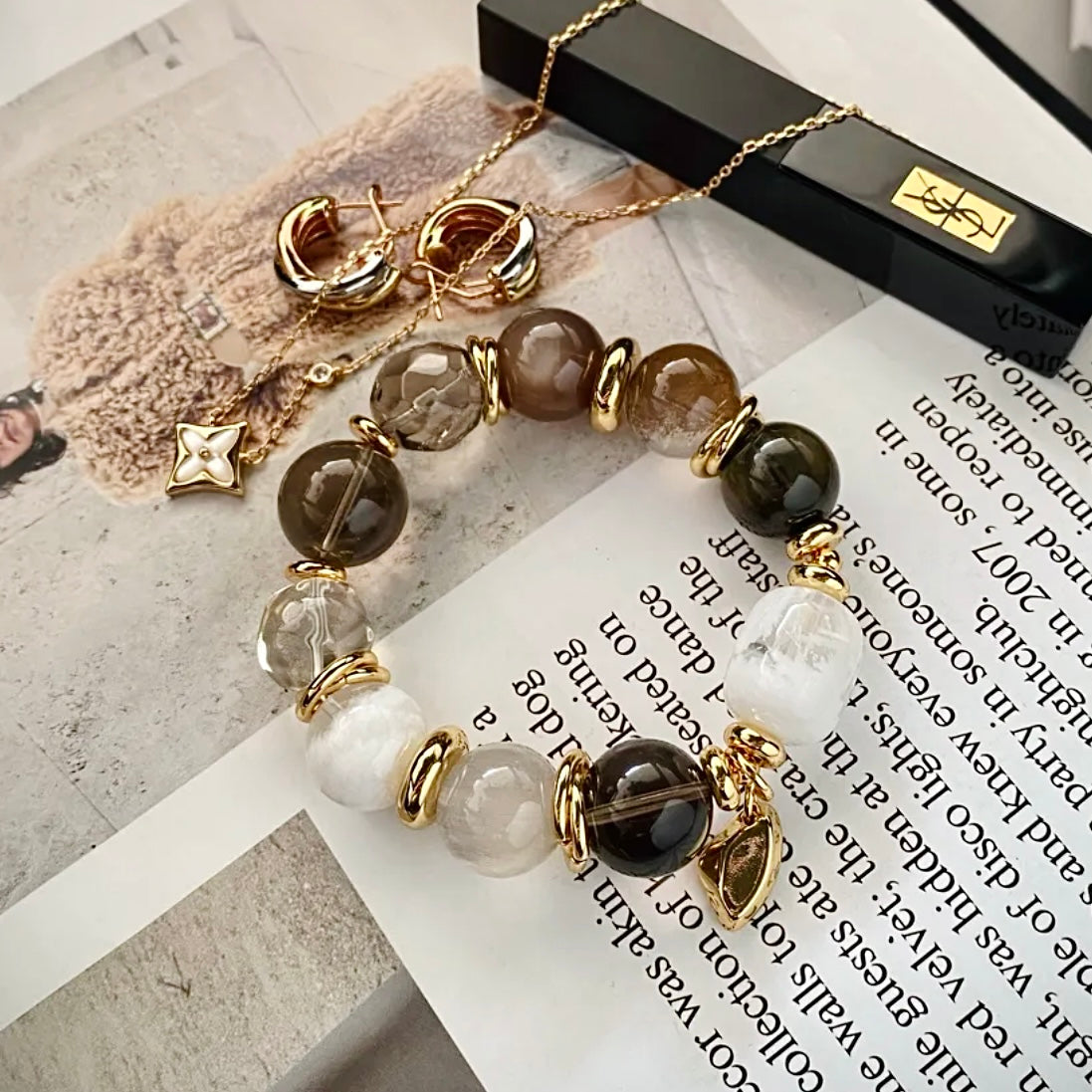 Vintage-inspired crystal bracelet featuring hare's fur quartz and leopard print resin accent, detail view