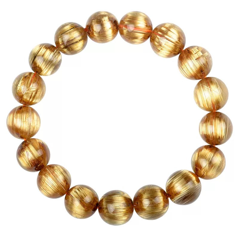 Gentle Crystals Zen Fortune Key bracelet displayed on a minimalist spa-inspired flat lay